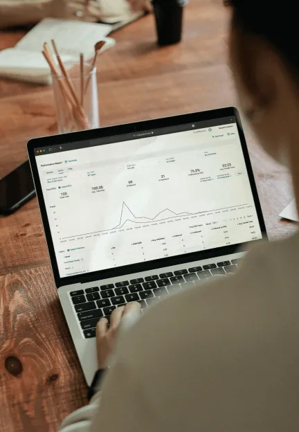 A woman viewing sales data and insights extracted from RingCentral Analytics
