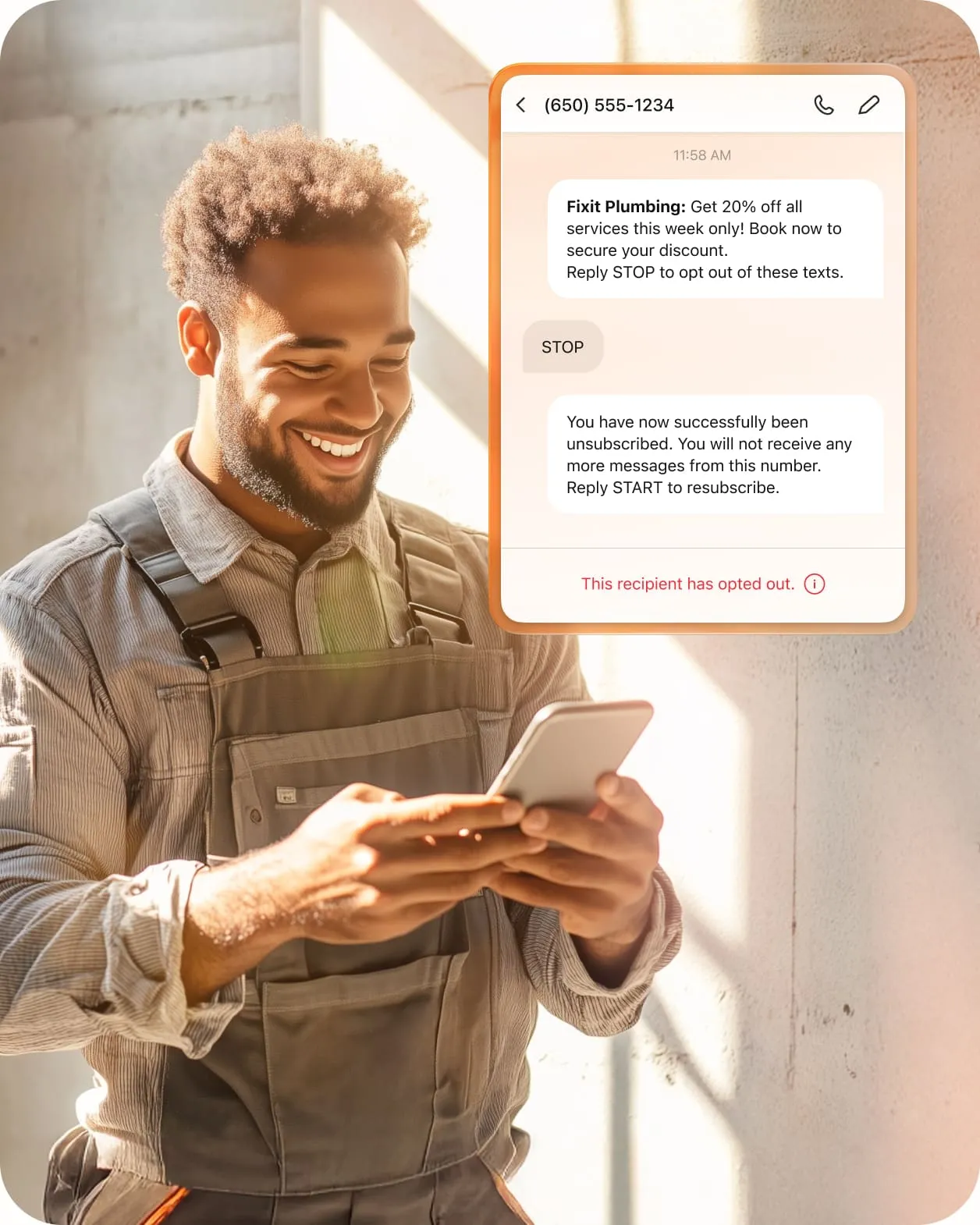 A man in light brown overalls holding his mobile phone featuring SMS thread about opting out of receiving SMS from Fixit Plumbing