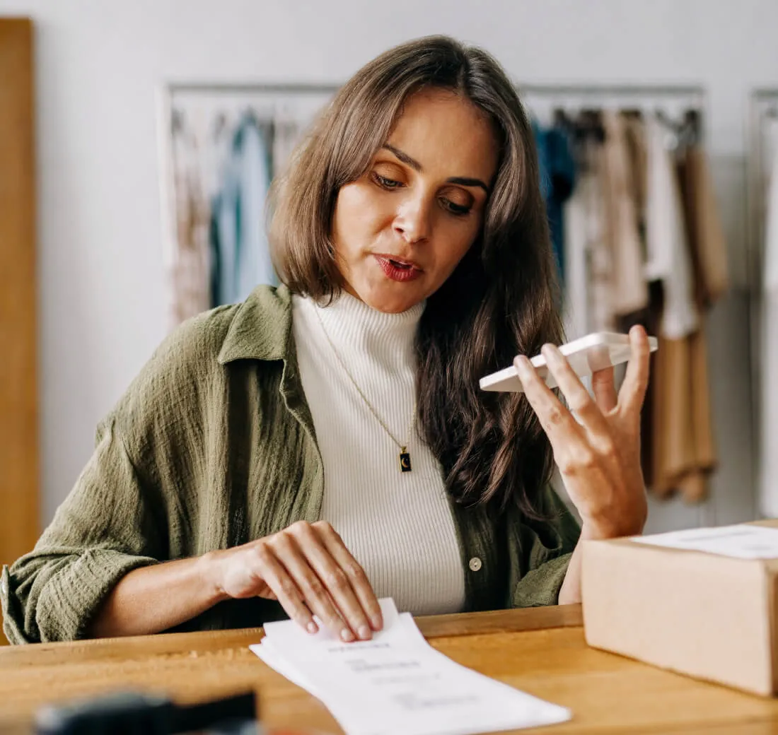 A female entrepreneur on a call using the RingCentral mobile app